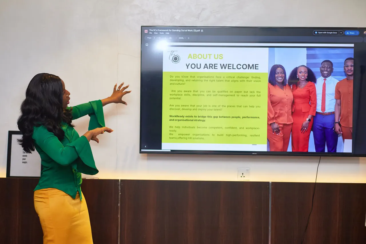 A facilitator welcoming participants to a session