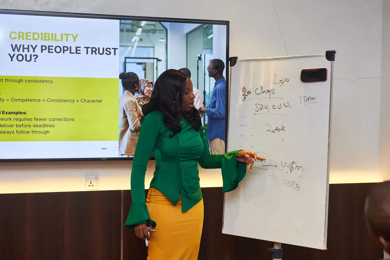 A facilitator building trust and workplace skills with participants